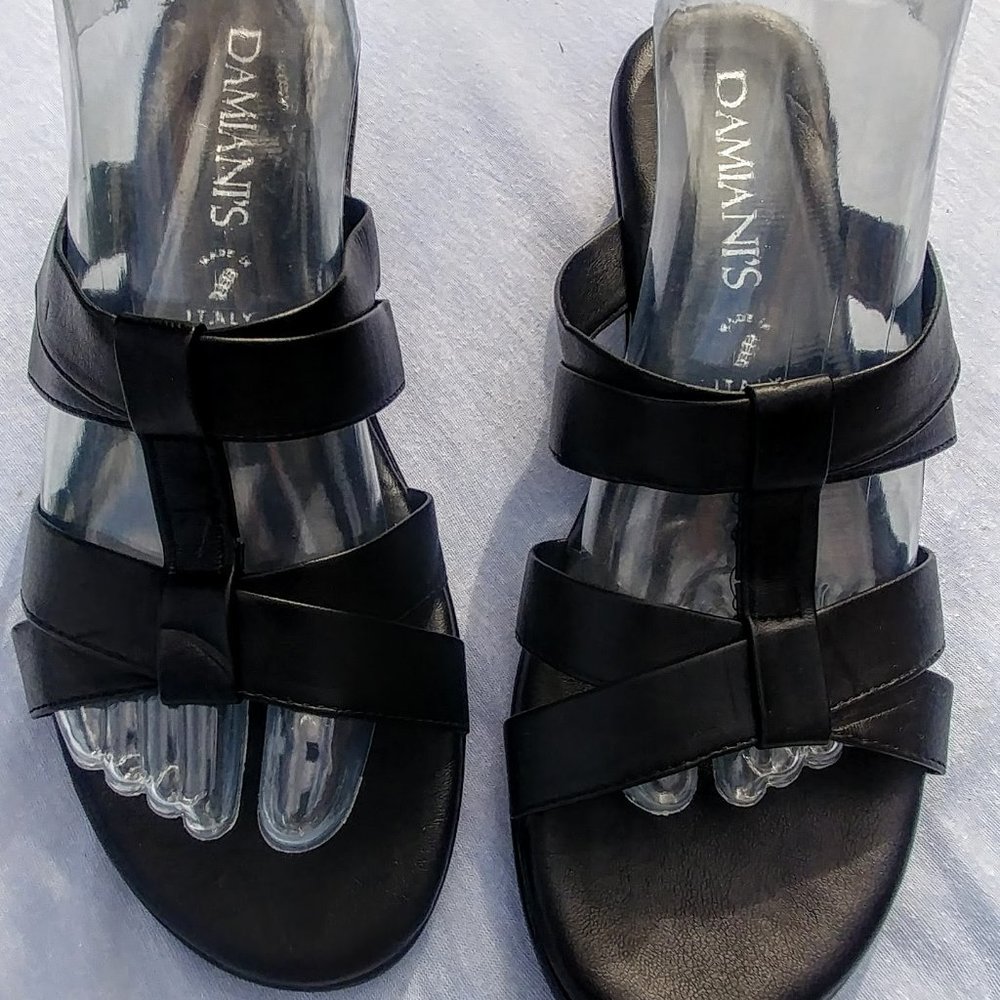 Damiani's  black slip-on sandals